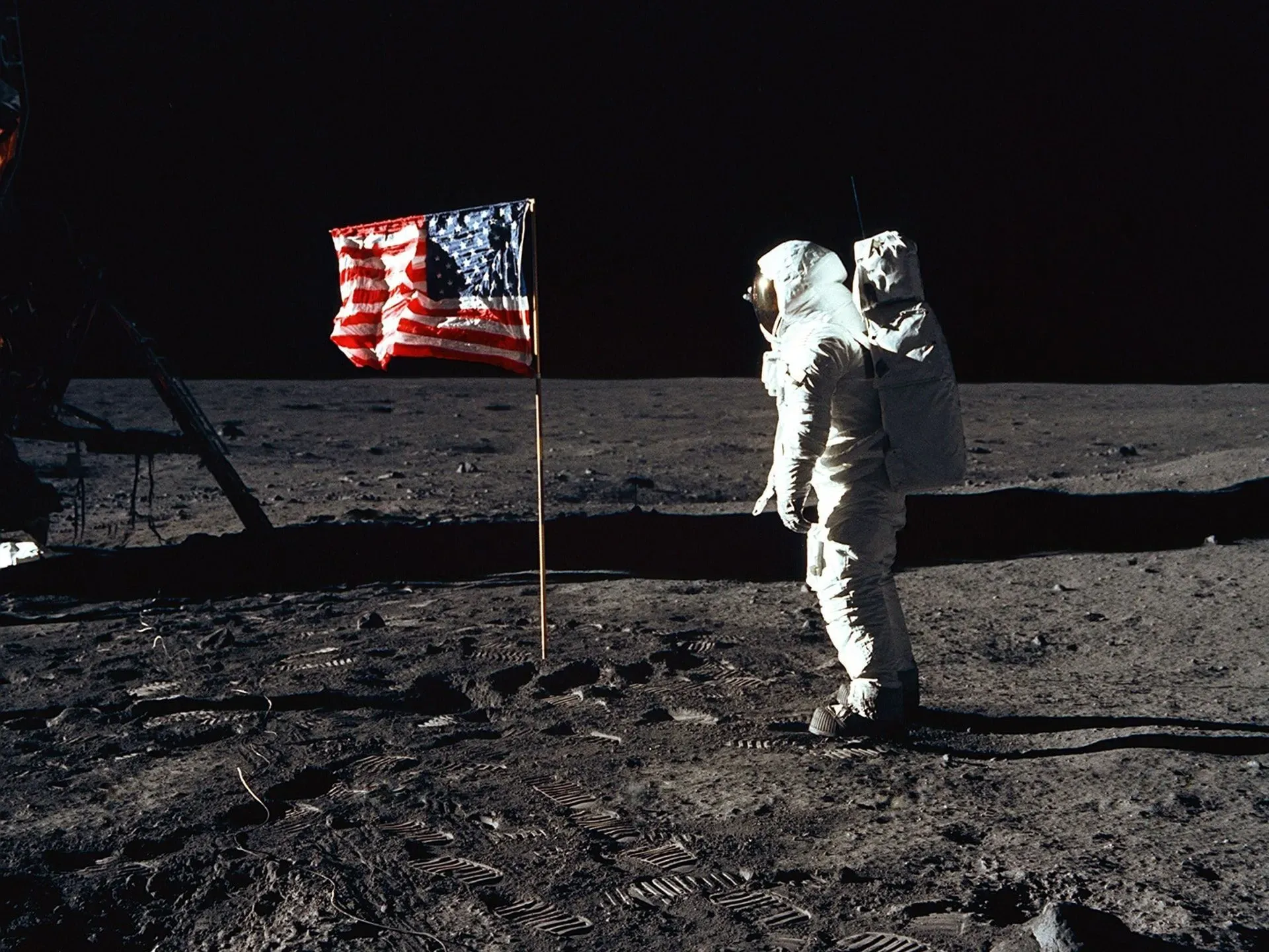 Making footprints on the Moon-Alan B Shepard.