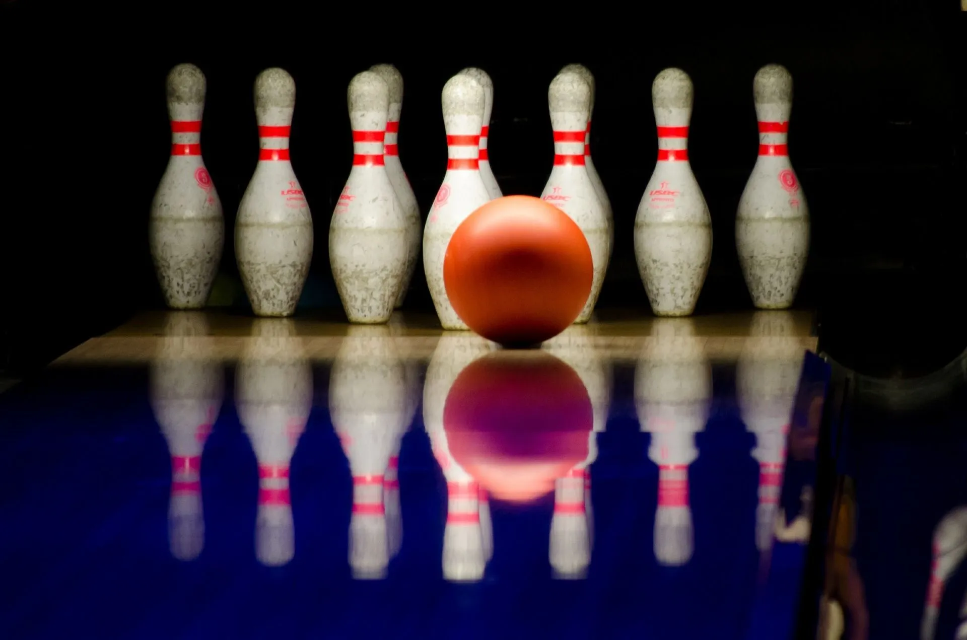 Bowling balls were made of wood in the early days, but are now made out of rubber and polyester resin.