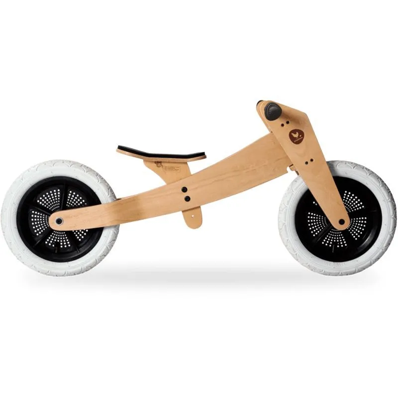Children can practise their balance skills on this wooden bike.