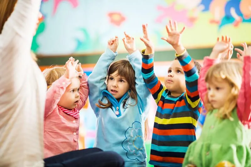 kids playing game with hands