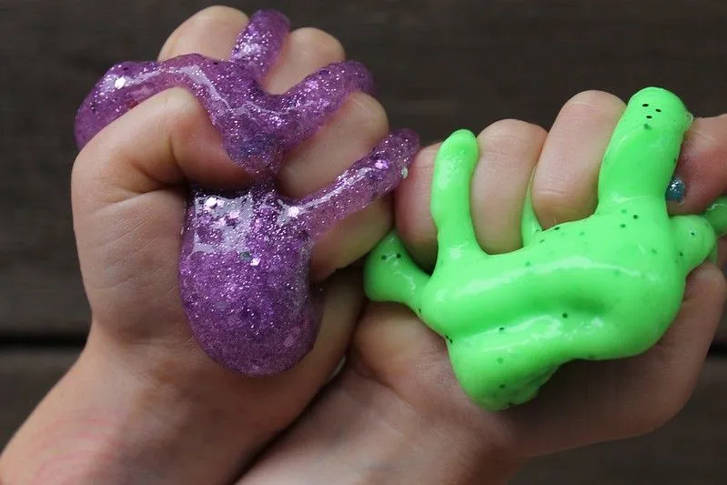 Child playing with slime