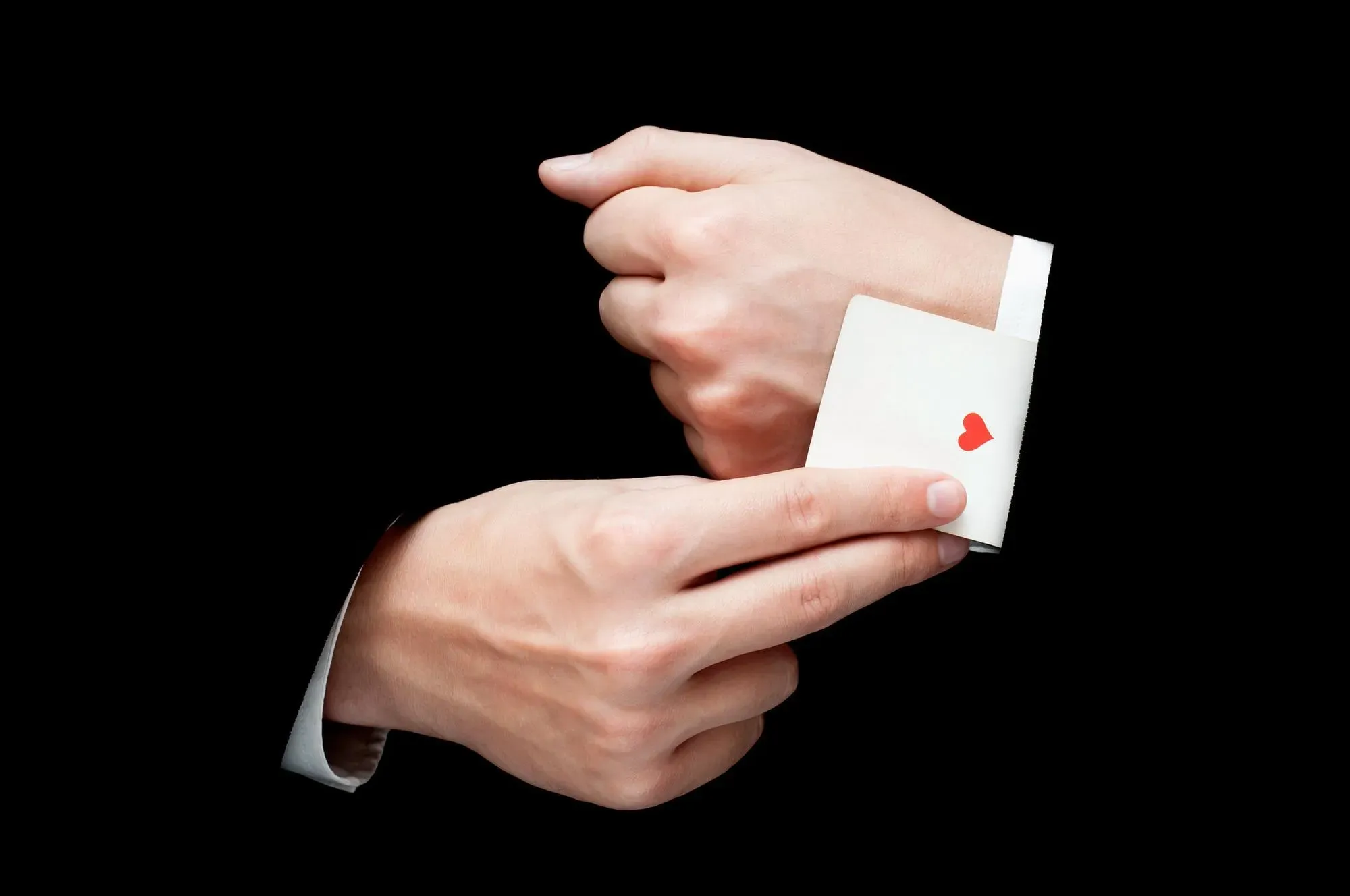 magician hiding a card up their sleeve