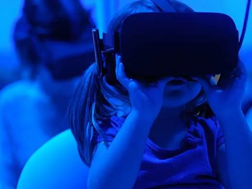 girl with VR goggles on 