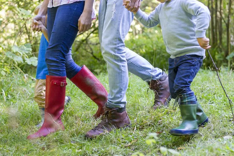 A family making the most of their hour walking outside.