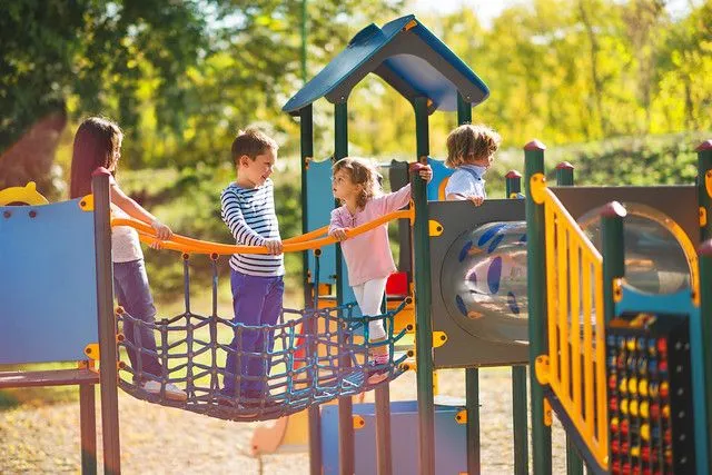 Children at a free day out at a playground. Image