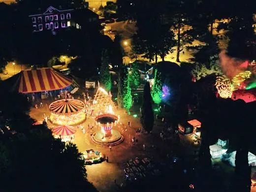 Horsham park filled with rides at nighttime for Enchanted Horsham festival
