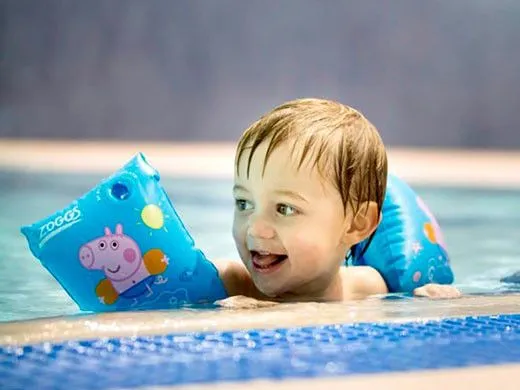 Little boy in a swimming pool