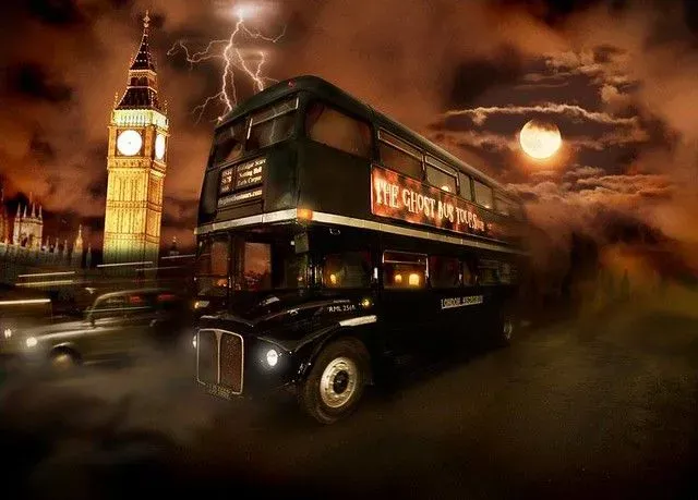 The Ghost Bus Tour passes by a stormy Big Ben