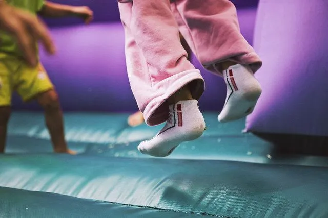 Child bouncing on a trampoline at Flip Out