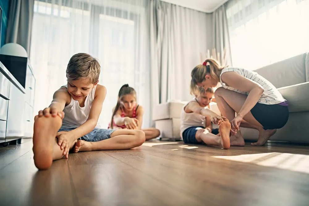 family doing stretches at home