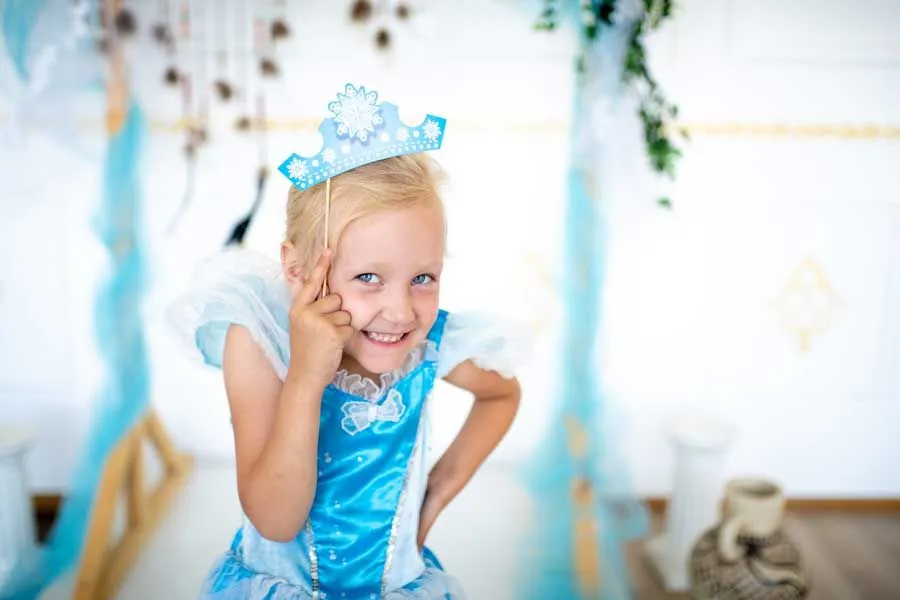 little girl with paper crown