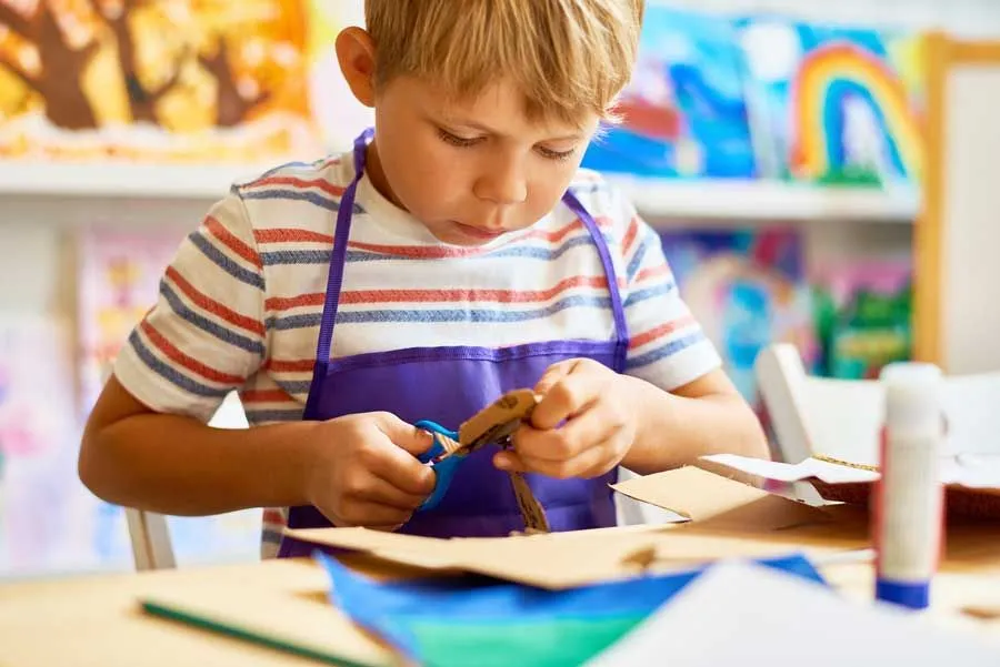 boy doing crafts