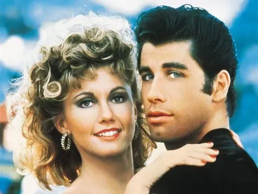 Sandy and Danny together in the Grease promotional poster.