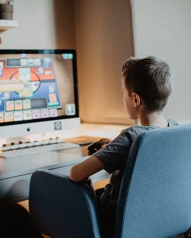 Child playing maze computer games, fun maze activities