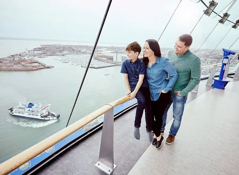 Parents and son admiring the view from the top of the Spinnaker Tower.