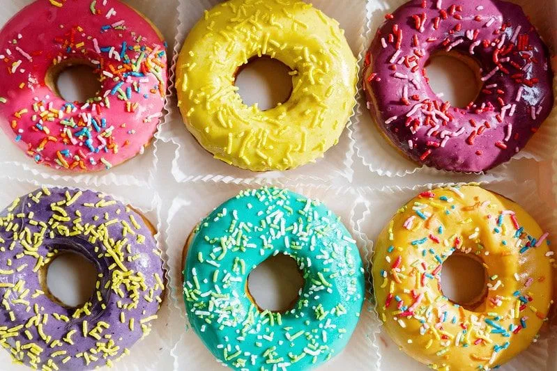 Tell people you're pregnant with colourful doughnuts.