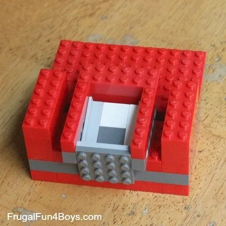 Add bricks to the base plate of your awesome lego candy dispenser