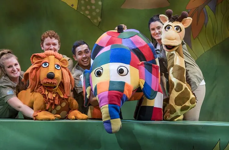 Large puppet show of Elmer the elephant and other characters from the book.