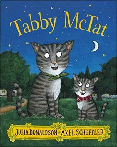 Cover of Tabby McTat: an adult striped cat and child striped cat sit on the grass in a park, happily looking at the night sky.