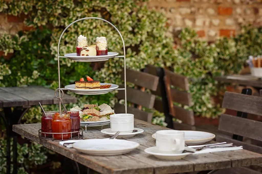 Family-friendly afternoon tea for two in the garden at Byfords.