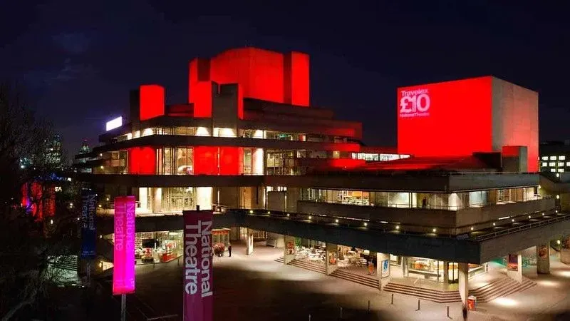 London's National Theatre lit up at night.