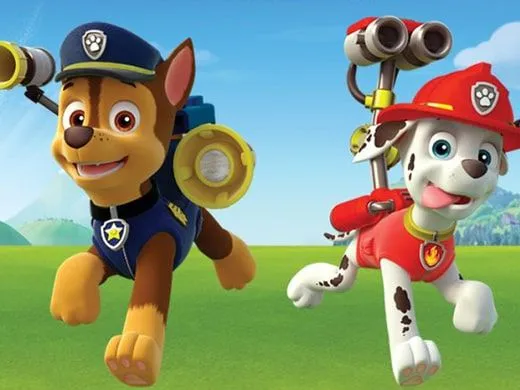 A shot of the dogs in PAW Patrol running across the grass.