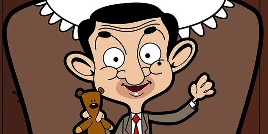 Cartoon Mr Bean holding up a teddy bear and smiling.
