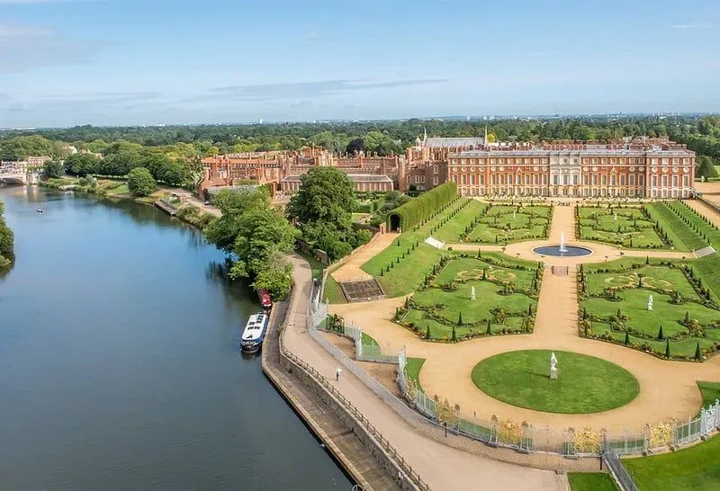 Hampton Court Palace and Gardens next to the River Thames. 