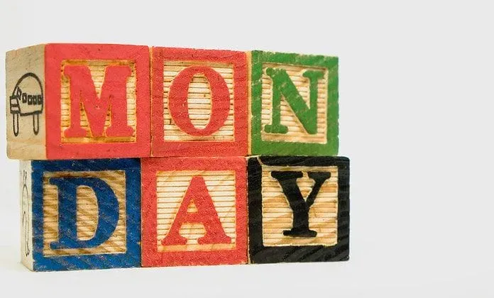 Wooden blocks spelling out Monday.