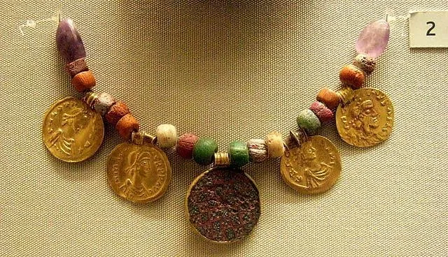 Anglo-Saxon necklace made from beads and large gold coins.