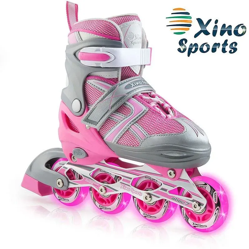 Pink and grey Xinosports roller skates.