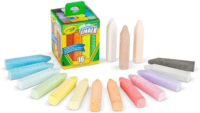 Chunky Crayola chalks laid out in a rainbow formation.