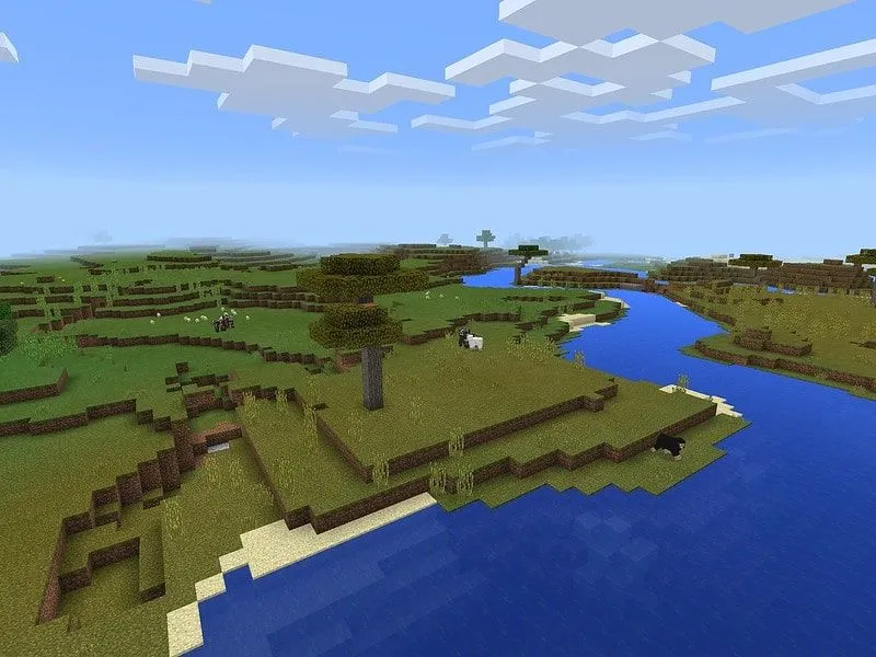 Aerial view of Minecraft island including the sea and sky.