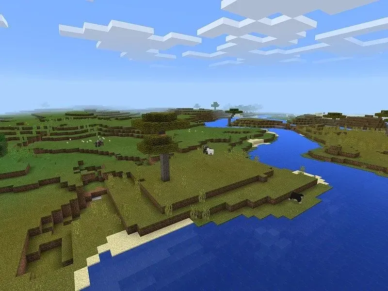 Aerial view of Minecraft island including the sea and the sky.