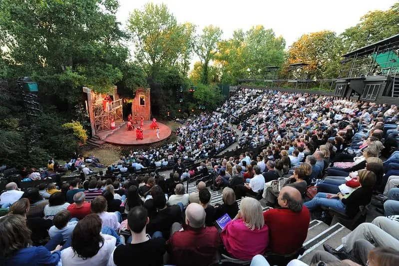 Crowd in front of the stage at Regent's Park Open Air Theatre.