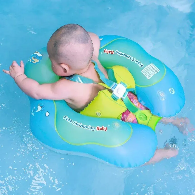 Baby in a Free Swimming Baby Pool Float.