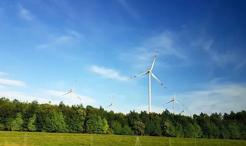 Wind turbines in the countryside generating sustainable, renewable energy.