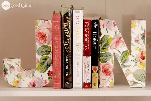 Big letters 'J' and 'N' in a floral design as bookends.