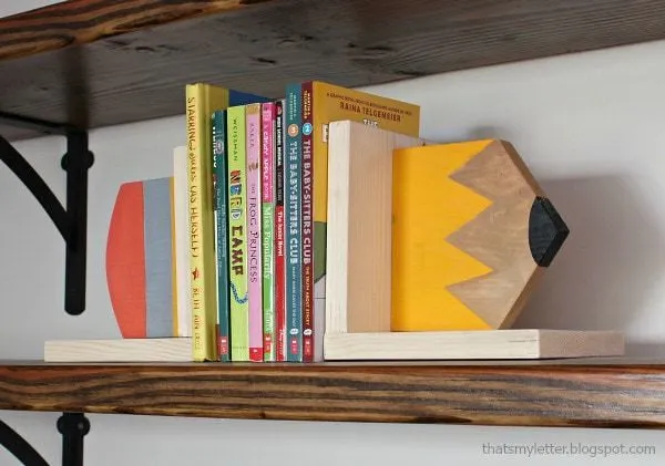 'To The Point' bookends - either half of a giant wooden pencil on each side if the books.  