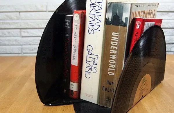 Records bent at a 90 degree angle to be used as bookends.