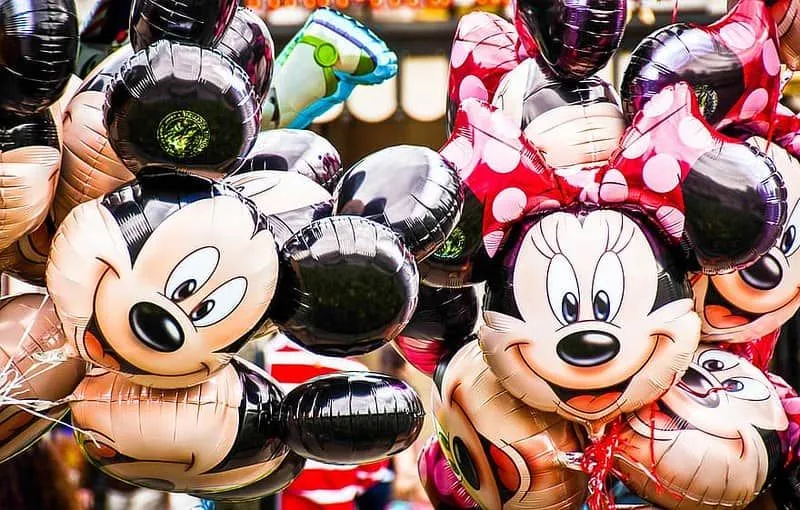 Disney balloons of Mickey and Minnie Mouse's faces.