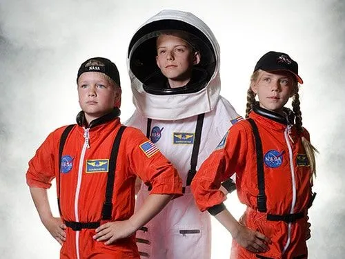 Three kids dressed in NASA uniform.