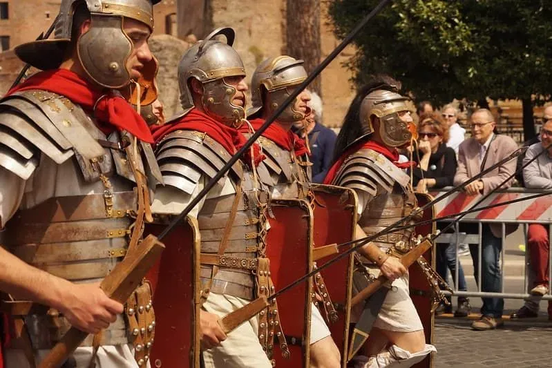 Roman soldiers marching forwards.