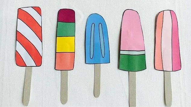 Painted ice lollies with a real ice lolly stick glued on to look lifelike.