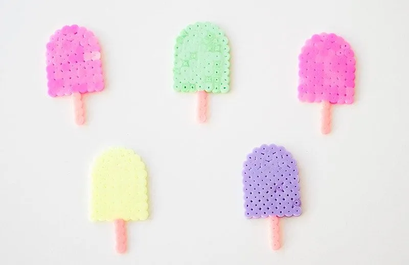 Colourful ice lollies made from Hama beads.