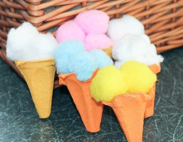 Ice cream cones made from egg cartons with coloured cotton wool balls as the ice cream scoop.