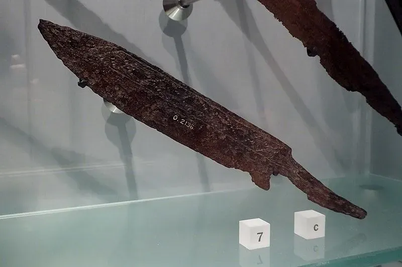 Seax knife, a Viking artefact, in a display case.