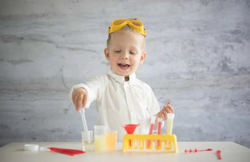 Boy doing science experiment