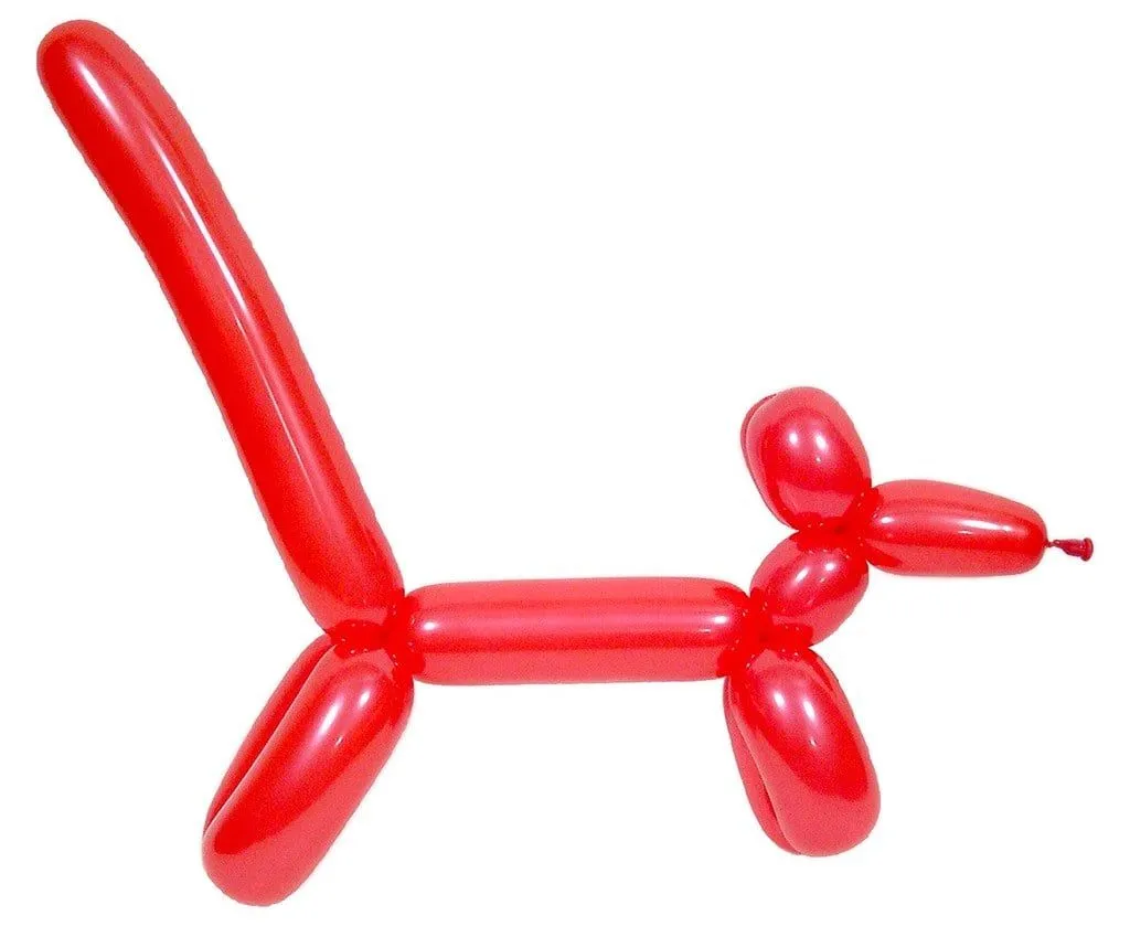 A red balloon dog against a white background.