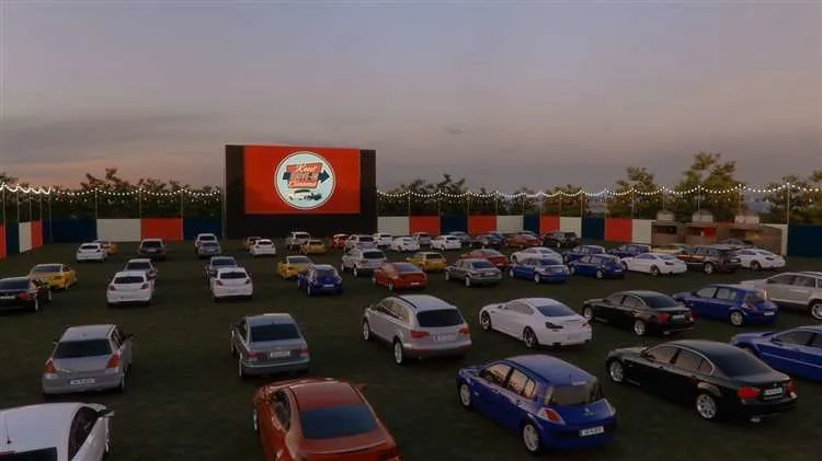 Cars lined up watching the big screen at Kent Drive In Cinema.